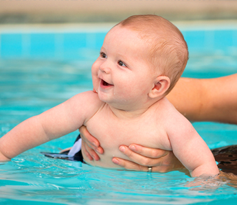 Baby Enjoying Saltwater Pool in Lawrenceville, GA